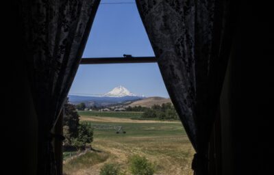 Photo of a mountain view out of a window