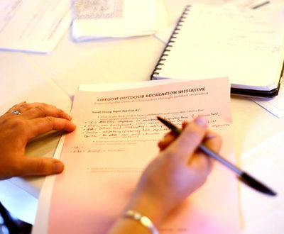 Image of a hand taking notes