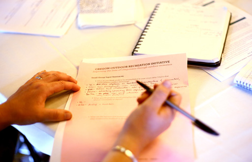 Image of a hand taking notes