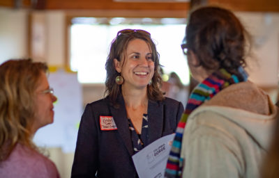 Women talking at a conference