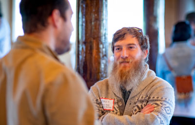 Men talking at a conference