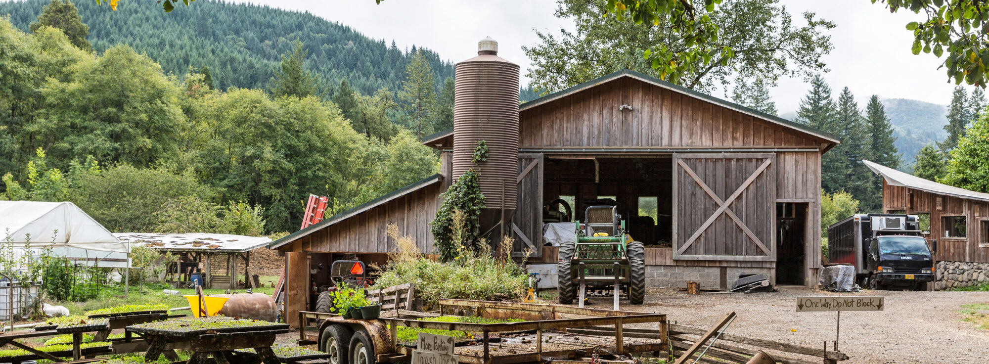 Rustic wood barn with tractor