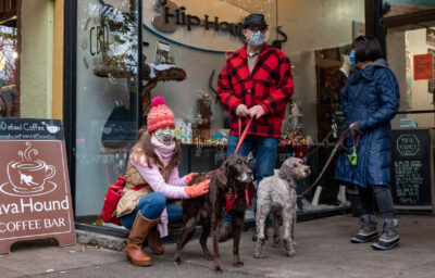 Couple grabbing coffee with two dogs Java Hound cafe.