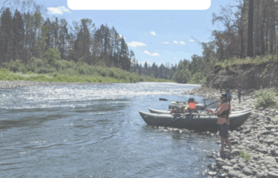 image of people in a boat on the water