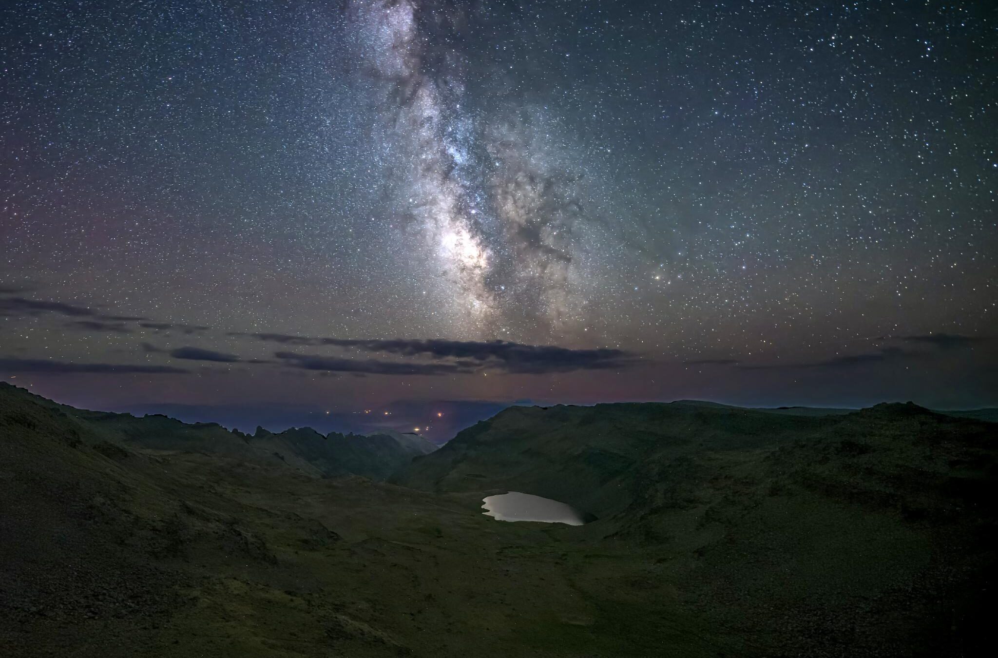 Night sky speckled with stars and a view of the Milky Way